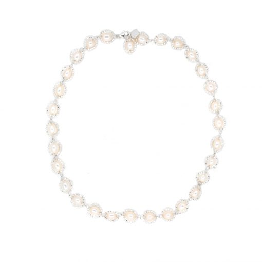 Simple pearl wedding necklace set on white background