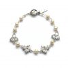 modern luxury diamante and pearl wedding bracelet on a white background