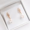 Image of aArt deco Downton Abbey style crystal pearl earrings in a white jewellery box on a white background