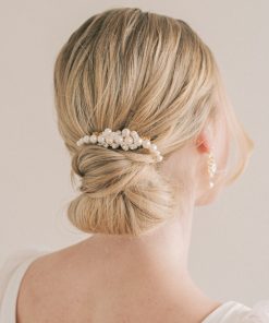 Juliette Pearl Comb. Image showing woman with a low bun and a small pearl hair comb.
