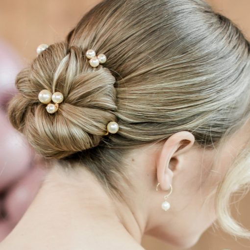 Alabaster Pearl hair pin - Head of woman with neat bun and ivory hairpins