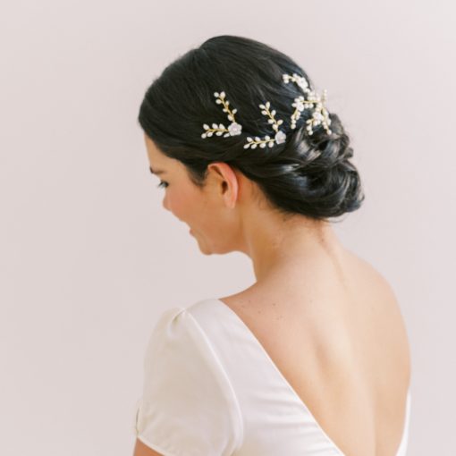 Faith Hair Pins. Image shows woman wearing freshwater pearl floral hair pins