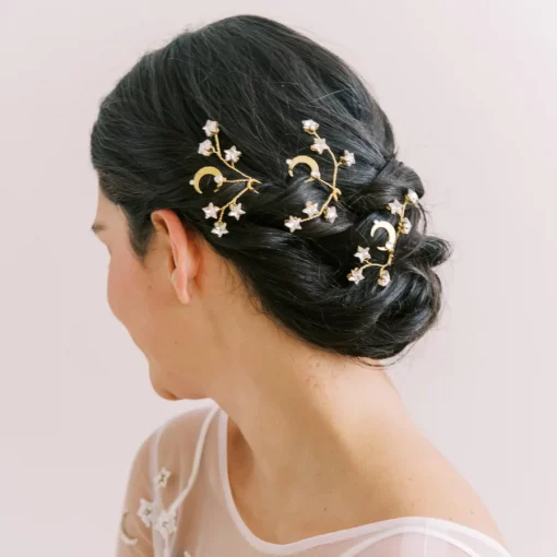 Gemini Star Hair Pins - image shows woman wearing star and moon hair pins