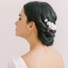 Woman with low bun and Flower hair comb