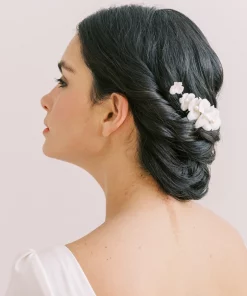 Woman with low bun and Flower hair comb