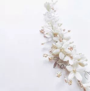 Bespoke Bridal Comb, clustered with ivory coloured flowers, blush pink pearls and crystals.