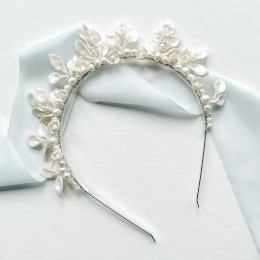 bridal leaf and floral crown set on a white background with light blue silk ribbon.